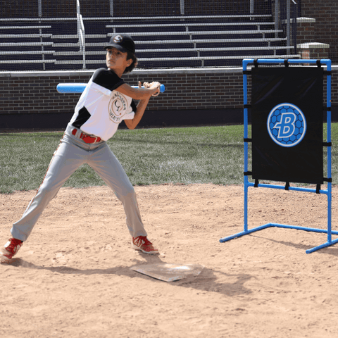 Young baseball player practicing swings using Blitzball StrikeZone Target for improved hitting accuracy