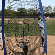 Baseball swing trainer bundle with a player practicing hitting in a baseball field setting