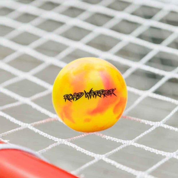 Road Warrior Street Hockey Balls - 15 Pack (Extreme Colours) in vibrant yellow and orange for outdoor games