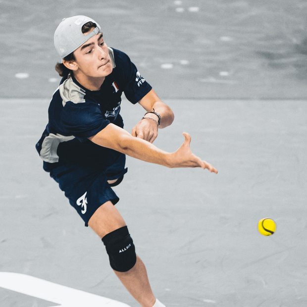 Player demonstrating a throw using the USA Baseball Baseball5 Ball during a competitive match