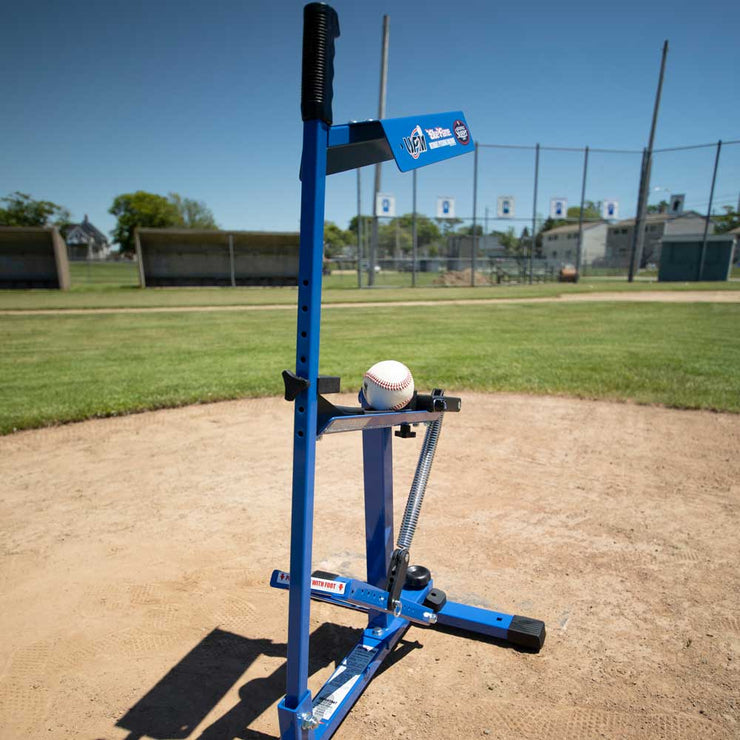 Louisville Slugger Blue Flame Pitching Machine Set Up on Baseball Field for Accurate Pitching Practice