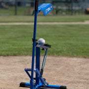 Louisville Slugger Blue Flame Pitching Machine set up on a baseball field ready to pitch training balls