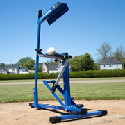 Louisville Slugger Blue Flame Pitching Machine on a baseball field for accurate training and practice