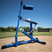 Louisville Slugger Blue Flame Pitching Machine on a baseball field for training and skill development