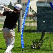 Youth player swinging bat at baseball into Louisville Slugger portable practice sock net for training
