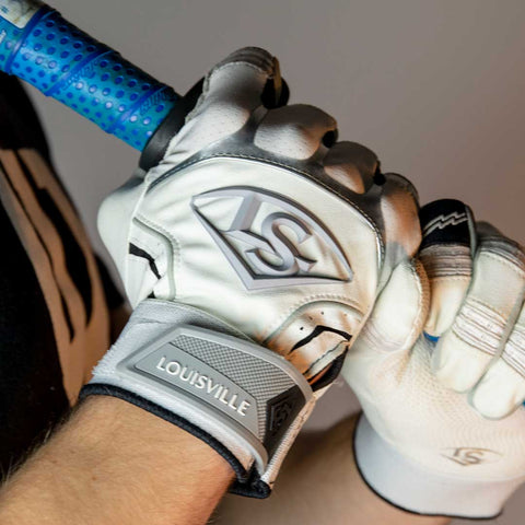 Player holding a bat with Louisville Slugger Power Grip for enhanced feel and control