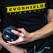 Athlete using Louisville Slugger XBALL grip strength & recovery trainer for improving hand strength